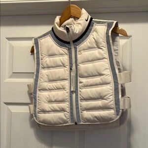 NWT Nike White and Gray Puffer Vest with reflective details.
